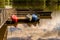 Canoes upside down on a dock on a lake