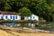 Canoes on the waters of the beach surrounded by the rainforest