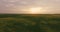 Canola fields in remote rural area with the sun setting