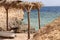 Canopy of palm leaves on the shore of the Red Sea, Egypt