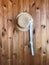 Canotier hat. Straw hat on wooden background