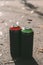 cans with red and green aerosol paint for graffiti