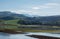 Cantabria landscape with field, mountains, river. Spain