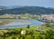 Cantabria landscape with field, river and a small town Treto.