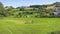 Cantabria landscape with field and a small village.