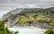 Cantabria landscape with hill, field and abrupt coast of the Atlantic Ocean.