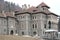 Cantacuzino Castle in winter with yard view