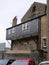 Cantilevered first floor extension on stone building