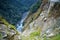 Canyon of mountain river on steep slopes, misty canyon, flashy river. Foothills Of Himalayas. Bhutan