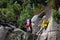 Canyoning climbing on an waterfall