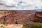 Canyonlands - Man with scenic view from Shafer Trail Viewpoint in Canyonlands National Park near Moab, Utah, USA