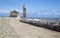 Caorle - Sanctuary of the Madonna dell`Angelo and tourist at sunset
