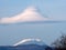 Cap cloud hovers over Mt. Fuji in the morning