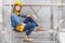 Capable young woman construction worker