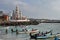 Cape Comorin Kanyakumari, India, West Bengal Tamil Nadu, March, 15, 2019. Fisherfolk on fishing boats from the beach and St. A