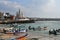 Cape Comorin Kanyakumari, India, West Bengal Tamil Nadu, March, 15, 2019. Fisherfolk on fishing boats from the beach and St. A