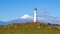 Cape Egmont lighthouse and Mount Taranaki, North Island, New Zealand