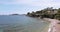 The cape Ferrat, embankment on the azure coast, mountains and the blue sky on background, megayachts of Billionaires