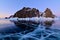 Cape Khoboy with Cracked Blue Ice of Lake Baikal at Twilight