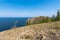 Cape Khoboy surrounded by the turquoise water of Lake Baikal is the northernmost point of Olkhon Island. Place of power in local