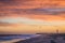 Cape May NJ lighthouse and Atlantic Ocean at sunset in springtime