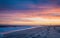 Cape May NJ lighthouse and Atlantic Ocean at sunset in springtime