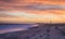 Cape May NJ lighthouse and Atlantic Ocean at sunset in springtime