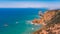 Cape Roca, Portugal. High hills and cliff over the Atlantic ocean. enjoying panoramic sea landscape. Picturesque seascape