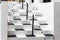 Cape Town, South Africa. Close up of black and white painted steps leading to the Kalk Bay Theatre, located in a renovated church