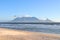 Cape Town view with city Skyline from the beach with some Windsurfers