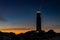 The Cape Trafalgar lighthouse signal light after sunset with colorful evening sky