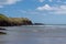 Cape of the Virgin Mary on a sunny day. The rocky Irish coast, rock formation near body of