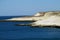 Cape with white cliffs in the ocean