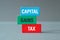 Capital gains tax - word concept on building blocks, text