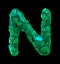 Capital letter N made of broken plastic green color isolated on black background