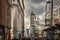 Capitol building in Gran Via boulevard under a dramatic sky