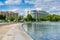 The Capitol reflecting pool and modern building in Washington, DC