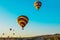 Cappadocia, Anatolia, Turkey: Colorful balloon on the background of the morning blue sky