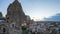 Cappadocia cave with view of city skyline day to night time lapse in Goreme, Turkey