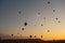 Cappadocia Turkey,  balloons against beautiful colorful sunset sky