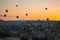 Cappadocia Turkey,  balloons against beautiful colorful sunset sky