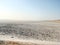 Cappadocia. Turkey. Panorama of the boundless dried salt pink lake.