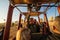 Cappadocia, Turkey - September 14, 2021: A hot air balloon pilot navigates his balloon through the sky near Goreme in the