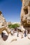 Cappadocia, Turkey. Tourists visiting carved into the rocks in the Valley of the monks\' cells Pashabag (Monks Valley)