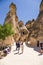 Cappadocia, Turkey. Tourists visiting cells carved into the rocks in the Valley of the Monks (Pashabag)