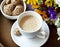 Cappuccino with Amaretti Biscuits and Flowers
