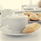 Cappuccino and biscuits on the kitchen table