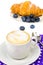 Cappuccino, blueberry and fresh croissant for breakfast