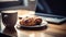 Cappuccino, Coffee And Pastries On Wooden Table With Laptop And Camera