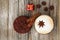 Cappuccino and cookie with star ansie and cinnamon stick Jingle bell and gift